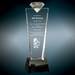 Crystal diamond top award mounted on a black pedestal base